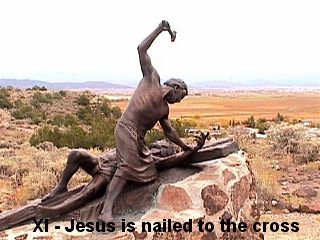 STATION XI - JESUS IS NAILED TO THE CROSS